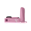 Product photo of a ghd smoothing hot brush with a pink handle and black bristles. The brush is lying on top of a box with Tickled Pink branding, beside which is a pink bag.